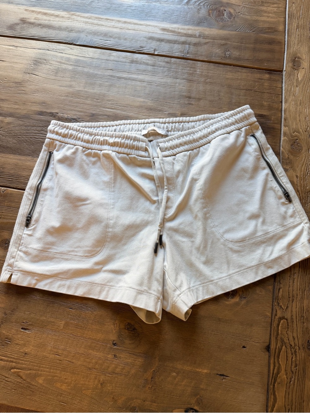 Athleta cream Drawstring Shorts with Zipper Pockets